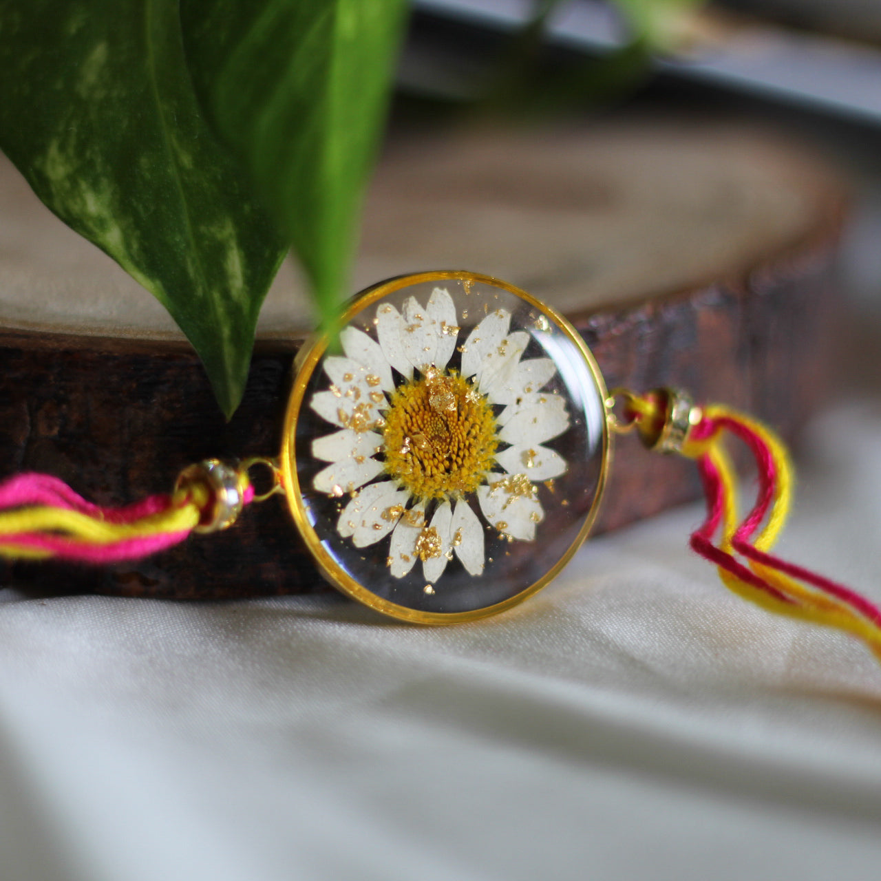 White Daisy Shimmer Gold Rakhi